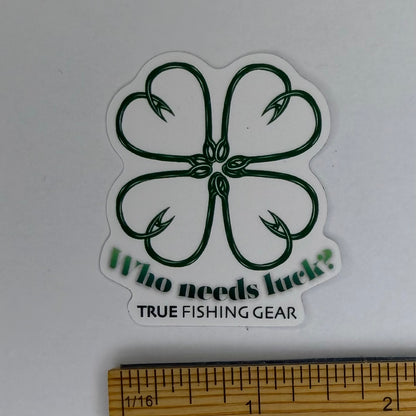 Sticker with fishing lure design and text 'Who needs luck? True Fishing Gear' on a white background.